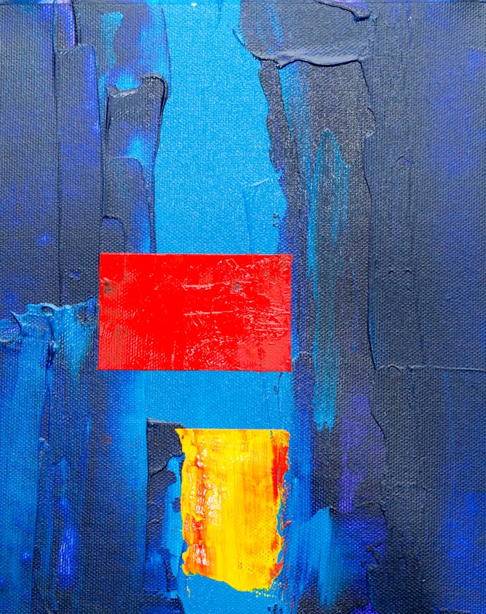 The Art of Drawing Readers In: Your attractive post title goes here Vibrant abstract painting featuring bold blue, red, and yellow hues on canvas.